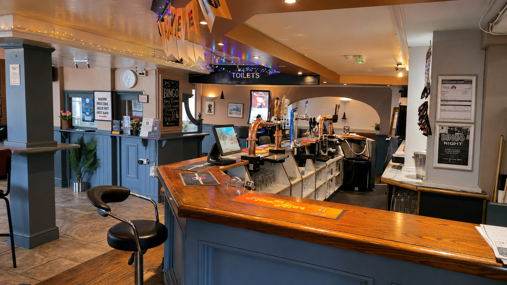 The bar inside The Queen Elizabeth pub in Gaywood, King's Lynn