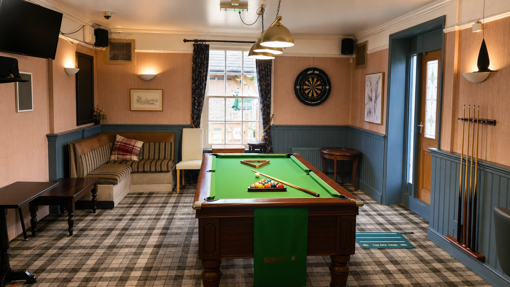 The games room with pool table at The Queen Elizabeth in King's Lynn